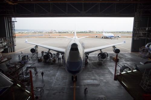 Resting in the hangar a Boeing 747-400 undergoes a C-check.