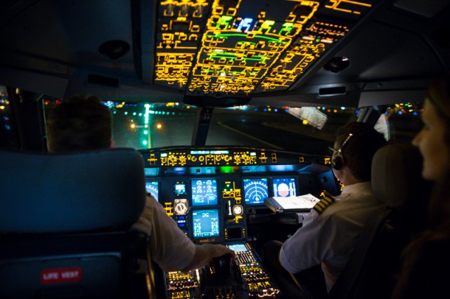 The pilots guide the giant Airbus A330 aircraft to the North Pole hangar after a successful flight.