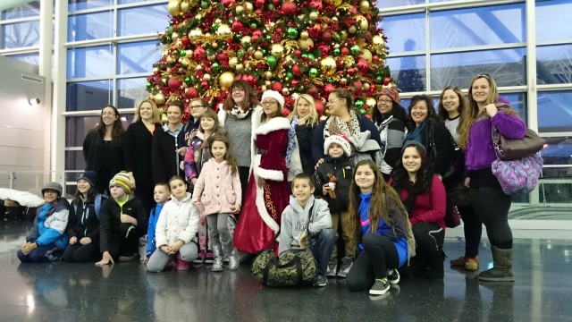 The New York passengers of Snowball Express pre-flight at the Christmas tree in American's terminal - Photo: Jason Rabinowitz