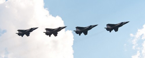 Four Mikoyan MiG-31s flying in formation -Photo: Sergey Vladimirov | Flickr CC