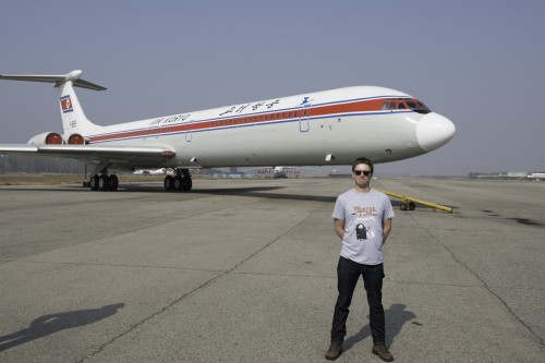 Bernie standing in front of a Air Koryo IL-62 - Photo: Bernie Leighton