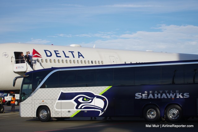 A Delta Aircraft getting ready to be boarded by Seattle Seahawks as they head to Phoenix for the Superbowl - Photo: Mal Muir | AirlineReporter.com