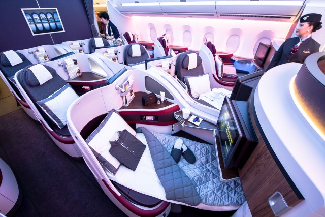 All business class seats convert to lie-flat beds complete with mattress and duvet Photo: Jacob Pfleger | AirlineReporter