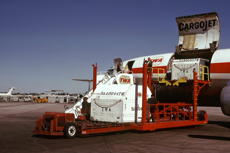 TWA 707 Cargo jet loading up pallets - Photo: George Hamlin