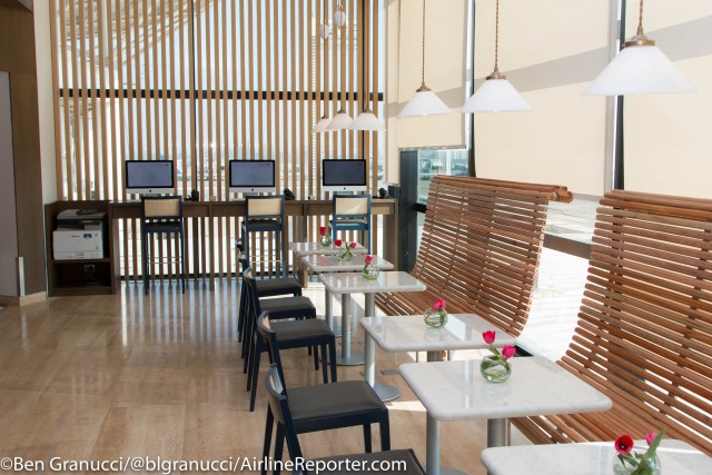 Seating area with computers for use in the background