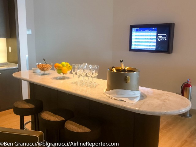 One of the champagne bars, along with snacks.