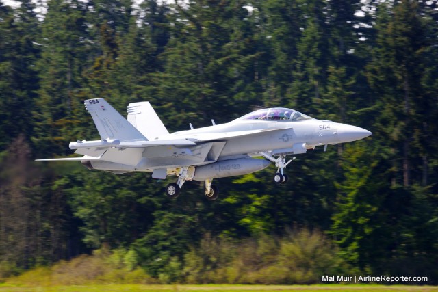 A Growler from VAQ-129 coming into land at NOLF Coupeville, he will be on the ground less than a second before taking off again, performing a Touch and Go.