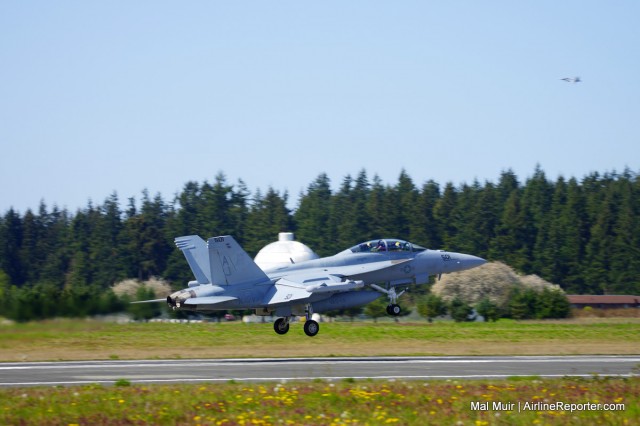 As one Growler conducts a Touch & Go, another one is already in the pattern ready for another shot at recreating a carrier landing.