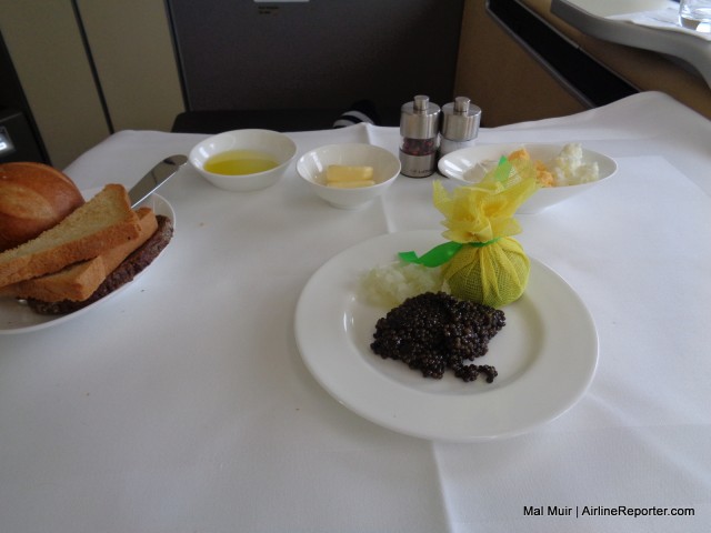 Caviar served with Traditional Garnishes.  I would like to think I knew how to eat this, but I really had no clue.