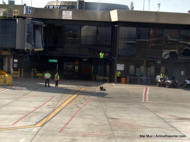 Being Guided into the gate at Newark.  Not something you can normally see, but being seated in the nose gives a unique perspective.