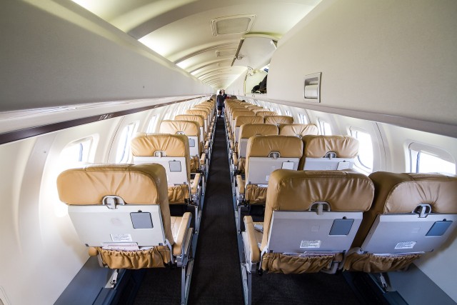 While the cabin & overhead bins are spacious, head room can be a bit of an issue for taller passengers.  Photo: Jacob Pfleger | AirlineReporter