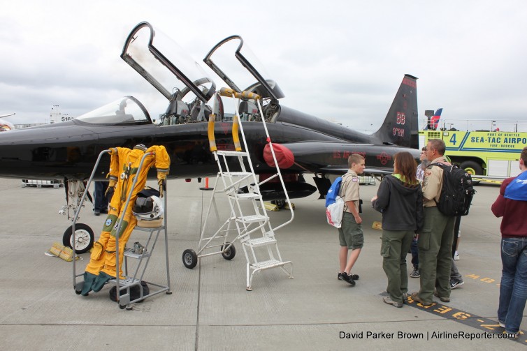 USAF F-5 trainer and fire truck in the background.