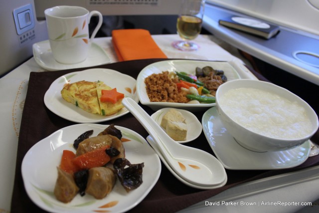 I went with a Chinese-style breakfast with plain porridge, egg pancake with shrimp, friend bean curd and traditional delicatessens