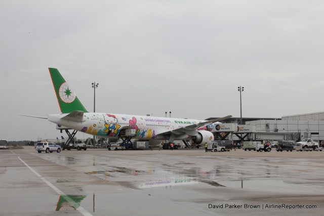 The Hello Kitty 777-300ER sitting at the gate in Houston