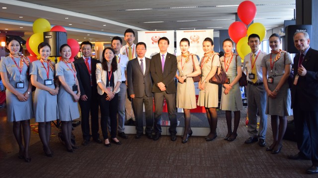 Hainan Airlines executives and the inaugural crew commemorate the occasion prior to boarding. - Photo: Lauren Darnielle | AirlineReporter