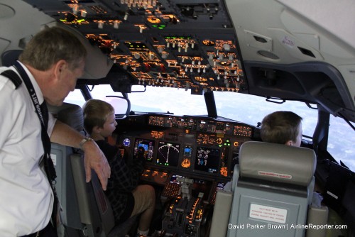 Some youth fly one of Alaska's 737 simulators