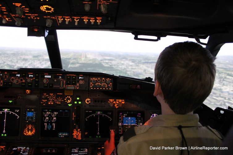 A young man concentrates on making his landing