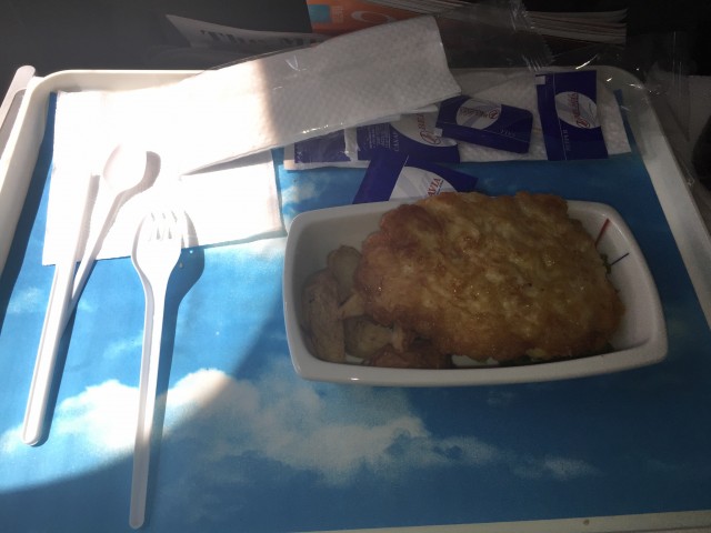 Poorly plated, but delicious, breaded chicken and potatoes. - Photo: Bernie Leighton | AirlineReporter