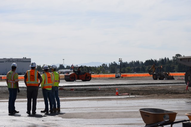 Paving work is progressing at the south end of the runway. - Photo: Lauren Darnielle | AirlineReporter