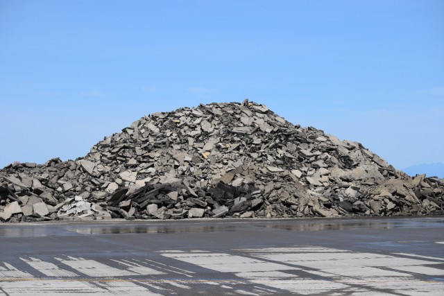 Asphalt excavated from the old runway. - Photo: Lauren Darnielle | AirlineReporter