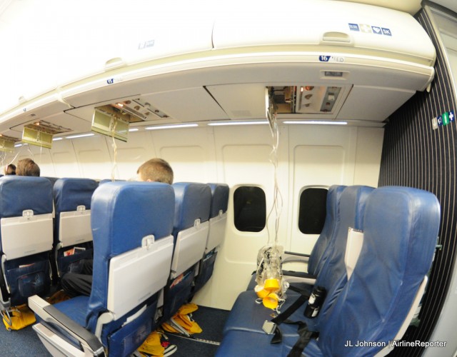 The view inside Delta's training cabin after the oxygen masks are deployed. 