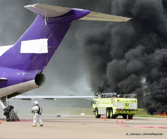 Firefighters inspect our "crashed" plane as ARFF extinguishes secondary fires. 