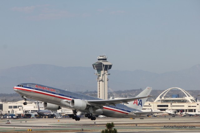 An American 777 taking off at LAX, with old livery - Photo: David Parker Brown