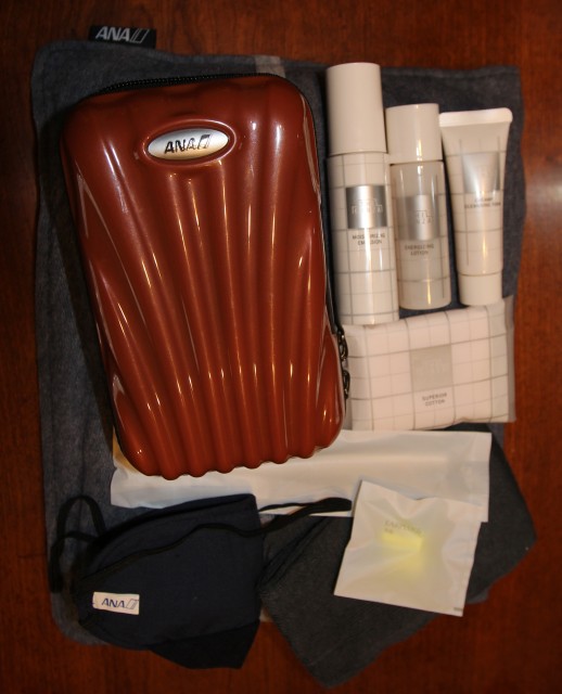 ANA first class Samsonite amenity kit and pajamas - Photo: David Delagarza: AirlineReporter