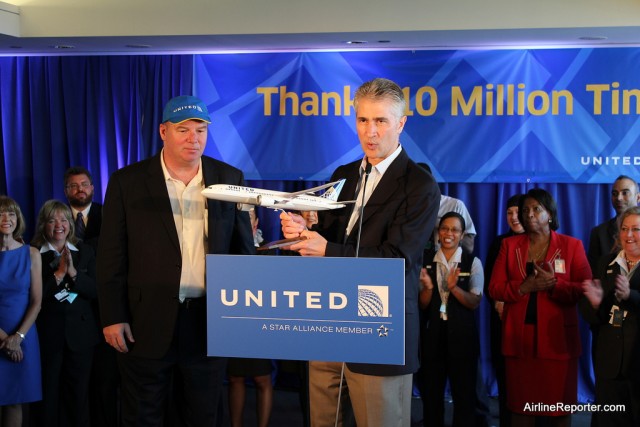 Jeff is excited to award a passenger flying 10million miles. Soon, Jeff will have plenty of time to add to his mileage count. 