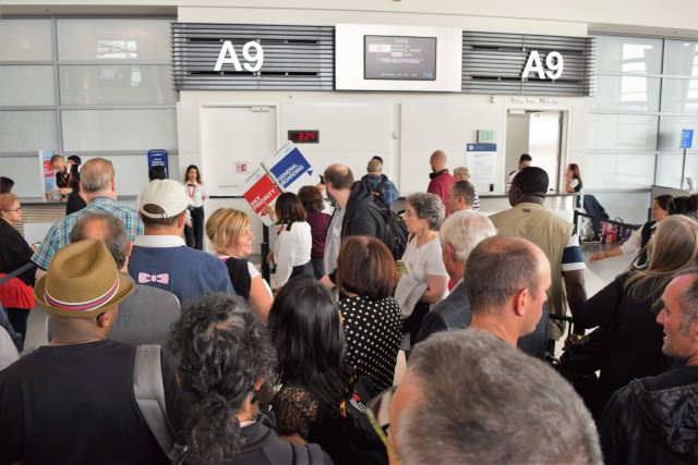 The Air France staff finally wheel out the directional signs... after pre-boarding had already commenced. Photo: John Nguyen | AirlineReporter