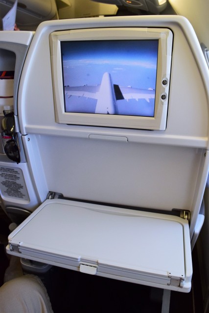 Flip-down tray table in Premium Economy + cool tail cam on Air France's A380. Photo: John Nguyen | AirlineReporter