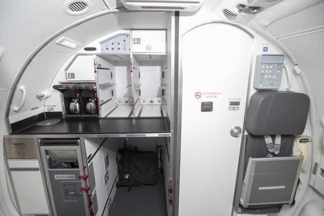 Aft galley and lavatory onboard an American Eagle E-175 at LAX. Photo: American Airlines
