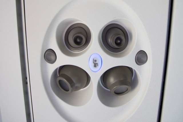 The overhead passenger service unit on an American Eagle E-175. All hail the air vents! Photo: American Airlines