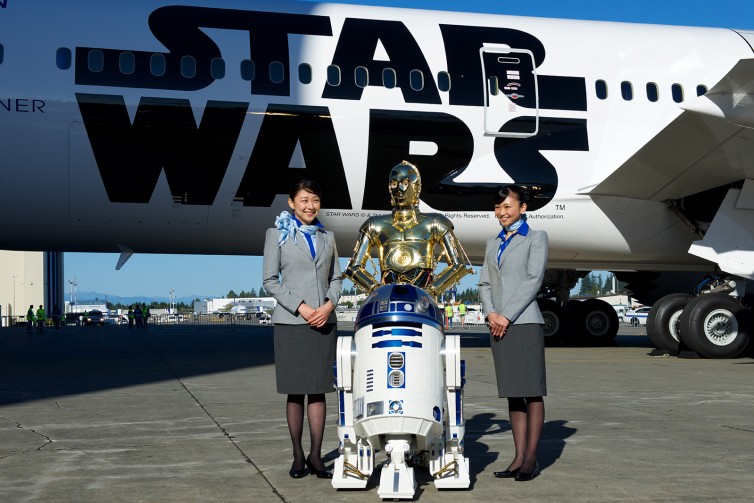 While C-3PO is fluent in over six million languages, he is not a trained flight attendant - Photo: Bernie Leighton | AirlineReporter
