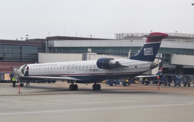 A US Airways CRJ-900 at an overcast San Jose Airport. Photo: John Nguyen | AirlineReporter