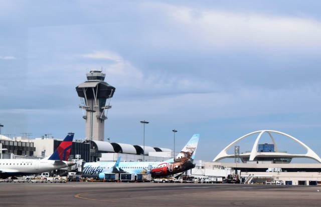 A view of LAX Terminal 6, with the tower and theme building in the background. Photo: John Nguyen | AirlineReporter