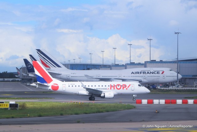 An Air France HOP! E-170 (F-HBXM) taxiing at CDG.