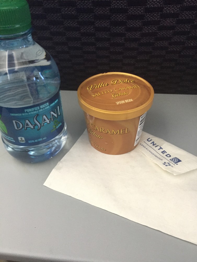 United Economy service, with ice cream dessert and bottled water - Photo: Blaine Nickeson | AirlineReporter