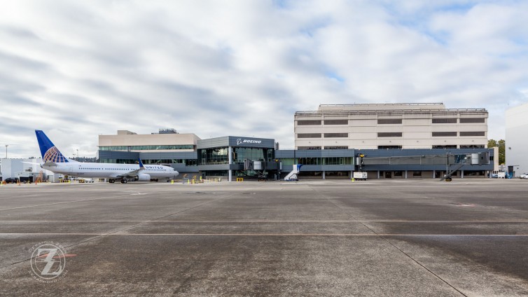 The new delivery center building has three gates and enough interior space to accommodate three simultaneous aircraft deliveries. The 737-900ER shown parked at the gate was delivered to United Airlines on Oct. 19.
