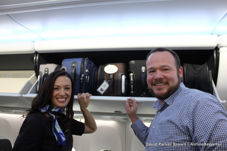 Alaska Airlines flight attendant Jenn-Marie Mann and I rock putting my bag in the bin