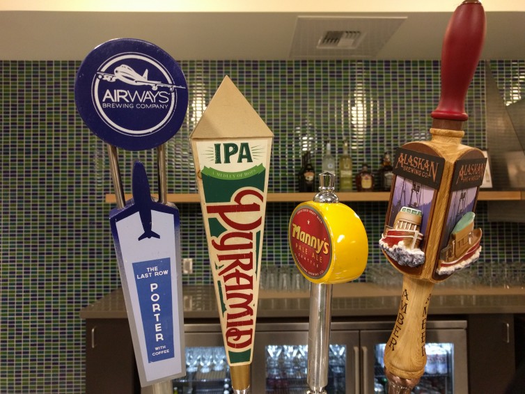 Beers on tap at the bar inside the new Alaska Airlines Board Room at SEA's N Satellite. Photo: Neil Enns | Dane Creek Photography