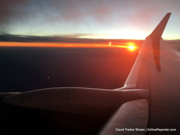 The sun by Delta's winglet