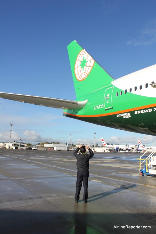 Chairman Cheng takes a photo of the tail of his newest plane