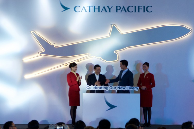 Cathay Pacific CEO Ivan Chu and Hong Kong Secretary for transport and housing Professor Anthony Cheung unveil Cathay's new look - Photo: Bernie Leighton | AirlineReporter