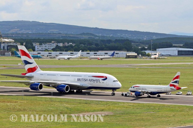 A British Airways A318 nose to nose with an A380 - Photo: Malcolm Nason Used with Permission.