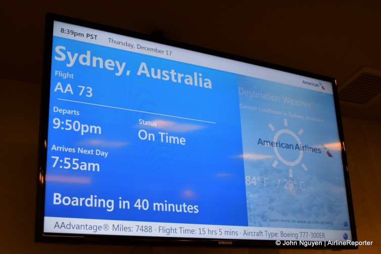Gate sign for the inaugural American flight from LAX to SYD.