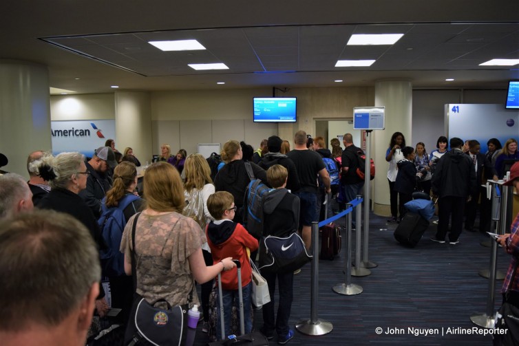 Passengers boarding the inaugural American flight to Sydney.