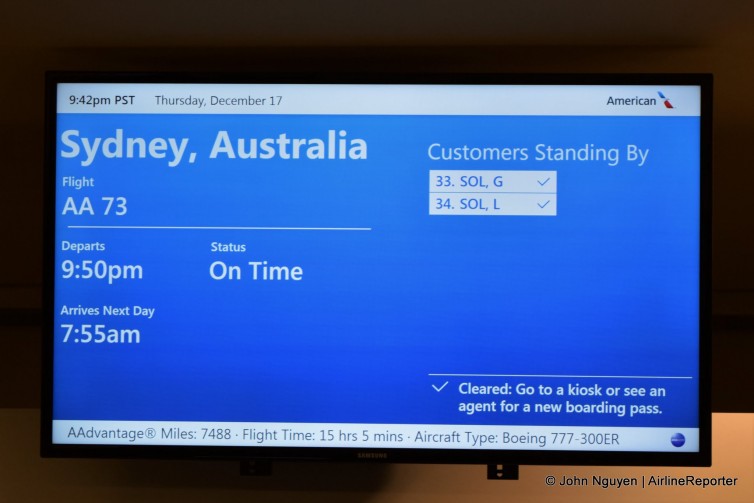 Gate sign for the inaugural American flight from LAX to SYD. All the standbys made it on.