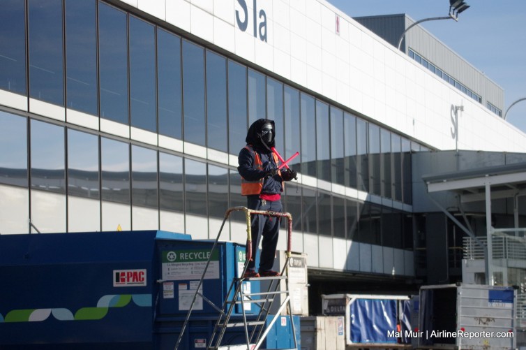 HO NO -- a Dark Lord of the Sith has found it's way onto the ramp! Nah, people went full out Star Wars for the visit.