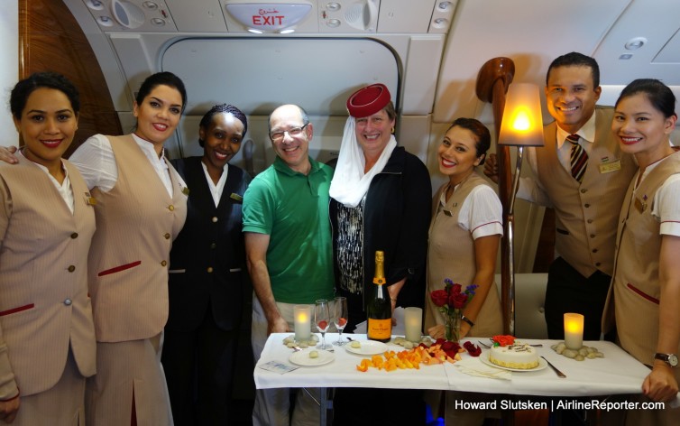 A surprise anniversary party at 40,000 feet! Karen got to wear the Emirate's singature uniform hat. Mayb I should have to cut the glare.